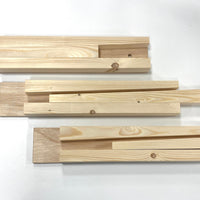 Houten vasthoudhulp 'helpende handjes'